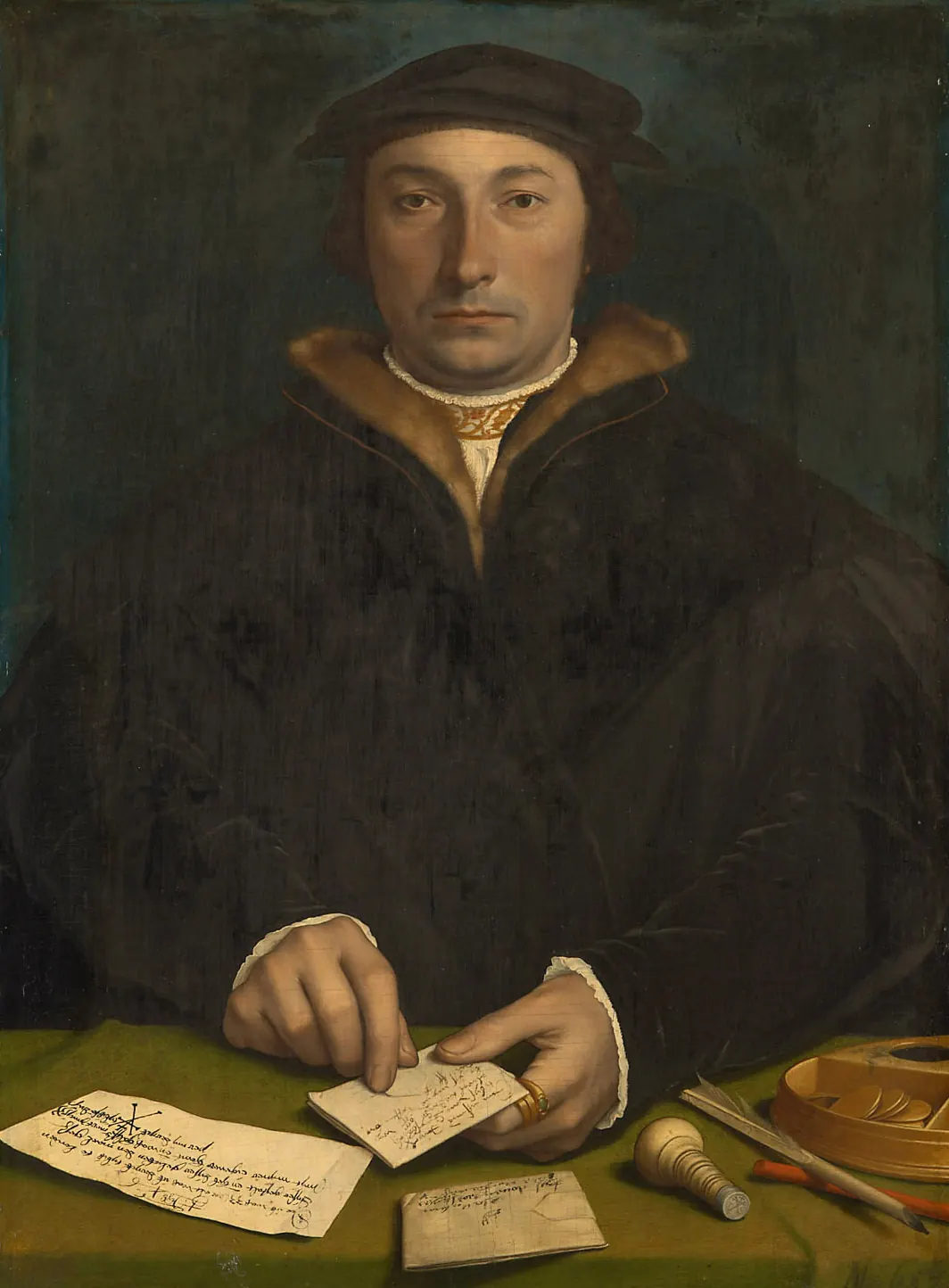 Portrait of a merchant in a black gown holding a folded letter, with letters, a seal, a quill and a box of coins on a green table